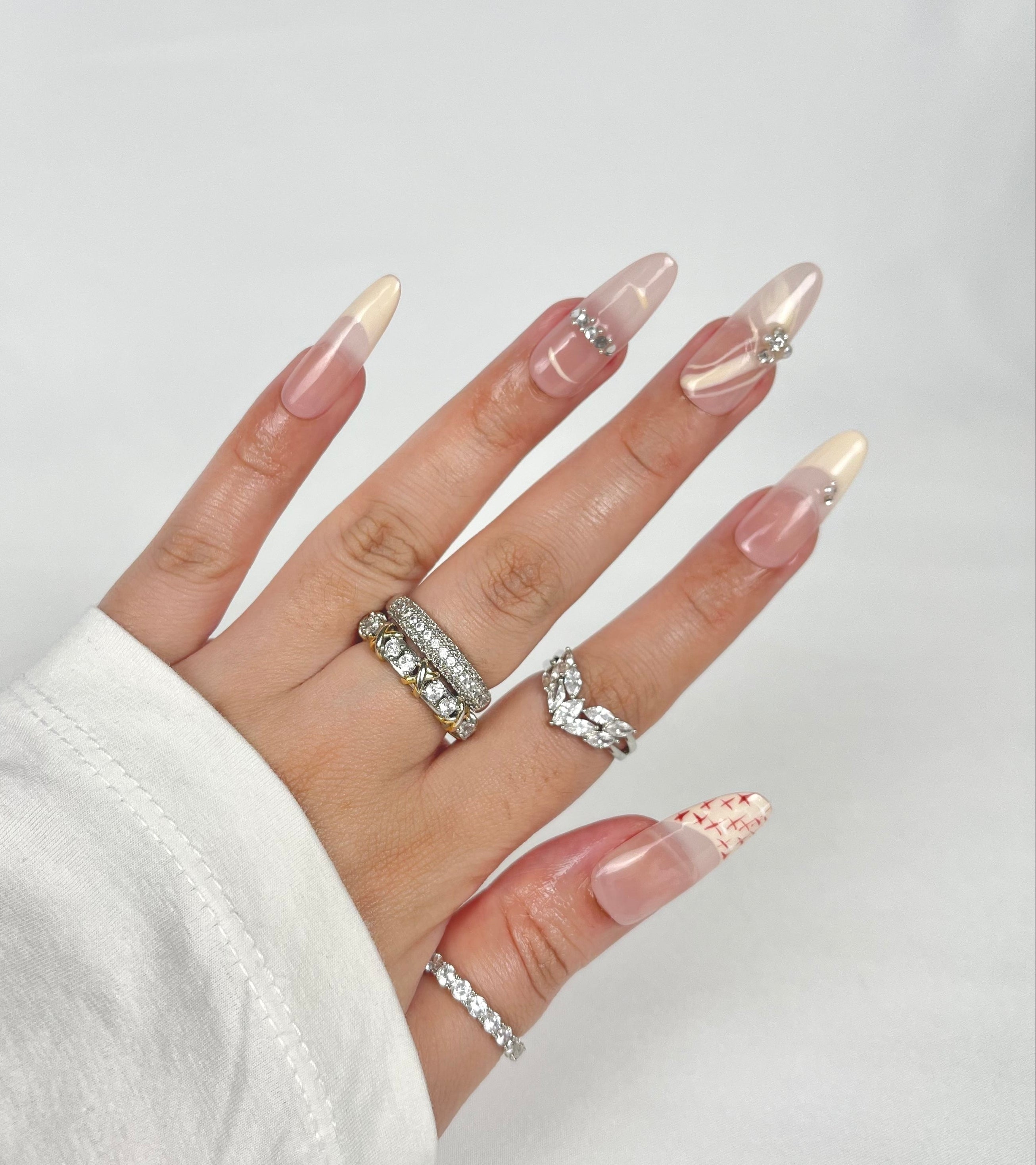Red Cross Stitch press-on nails nude gradient with red embroidery art — Ayna.B Dubai UAE