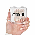 Red Cross Stitch luxury nail set white background — oval almond shape glossy finish — Ayna.B